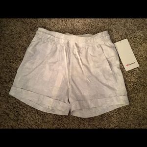 Never worn white Lululemon shorts!!
